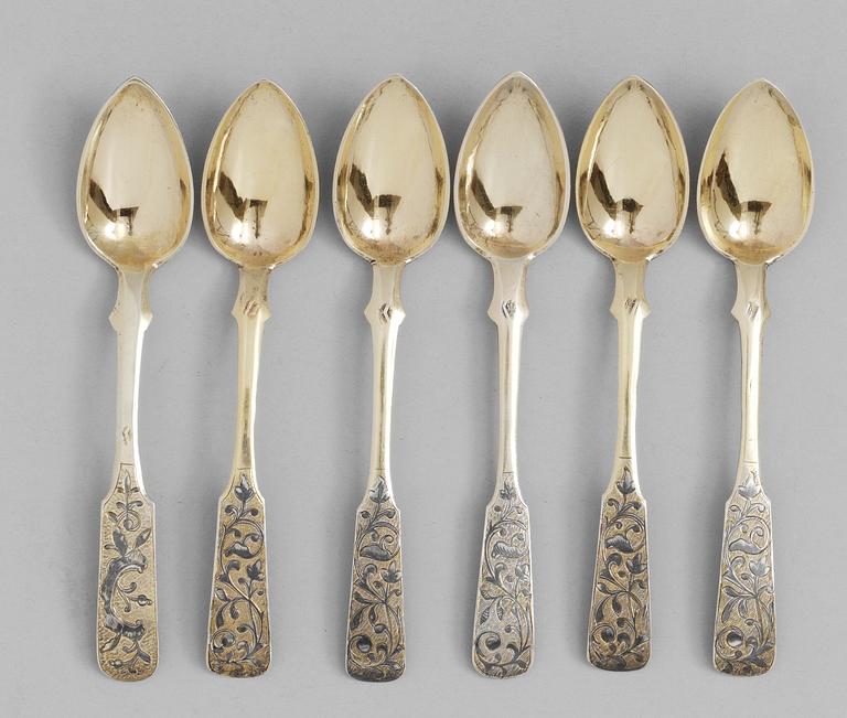 A SET OF SIX RUSSIAN SILVER-GILT AND NIELLO TEA-SPOONS, un identified makers mark, Moscow 1846.