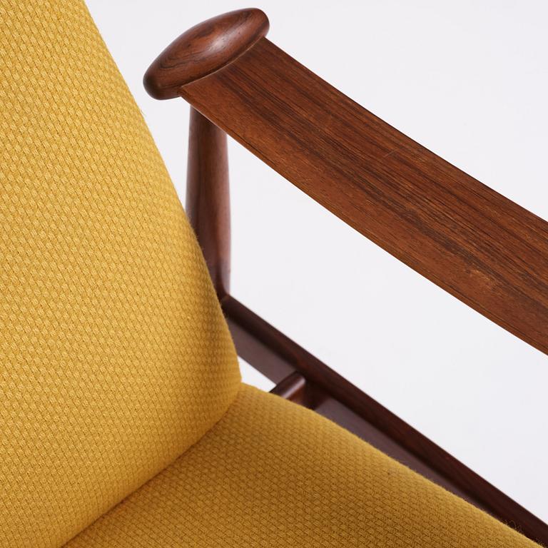 Finn Juhl, a 'model F-133' rosewood easy chair by France & Son, Denmark 1960s.