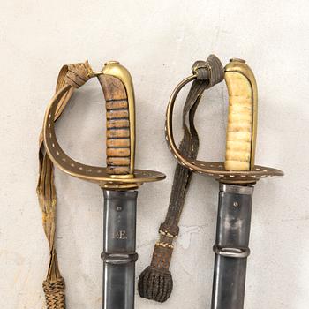 To Swedish sabres, 1893 cavalry pattern, with scabbards.