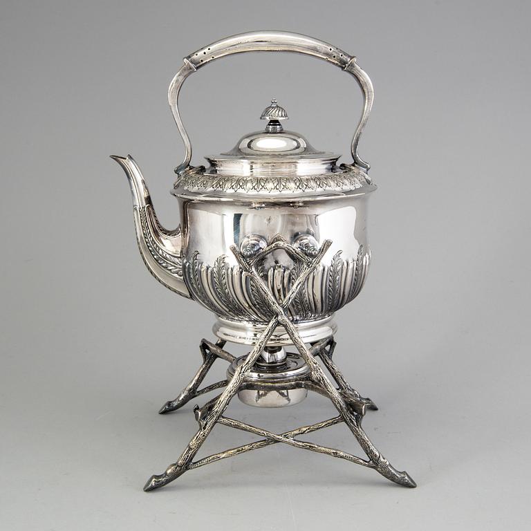 A 20th century tea pot on stand by Walker & Hall, Sheffield, England.