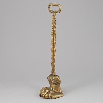 A 19th century bronze door stop.