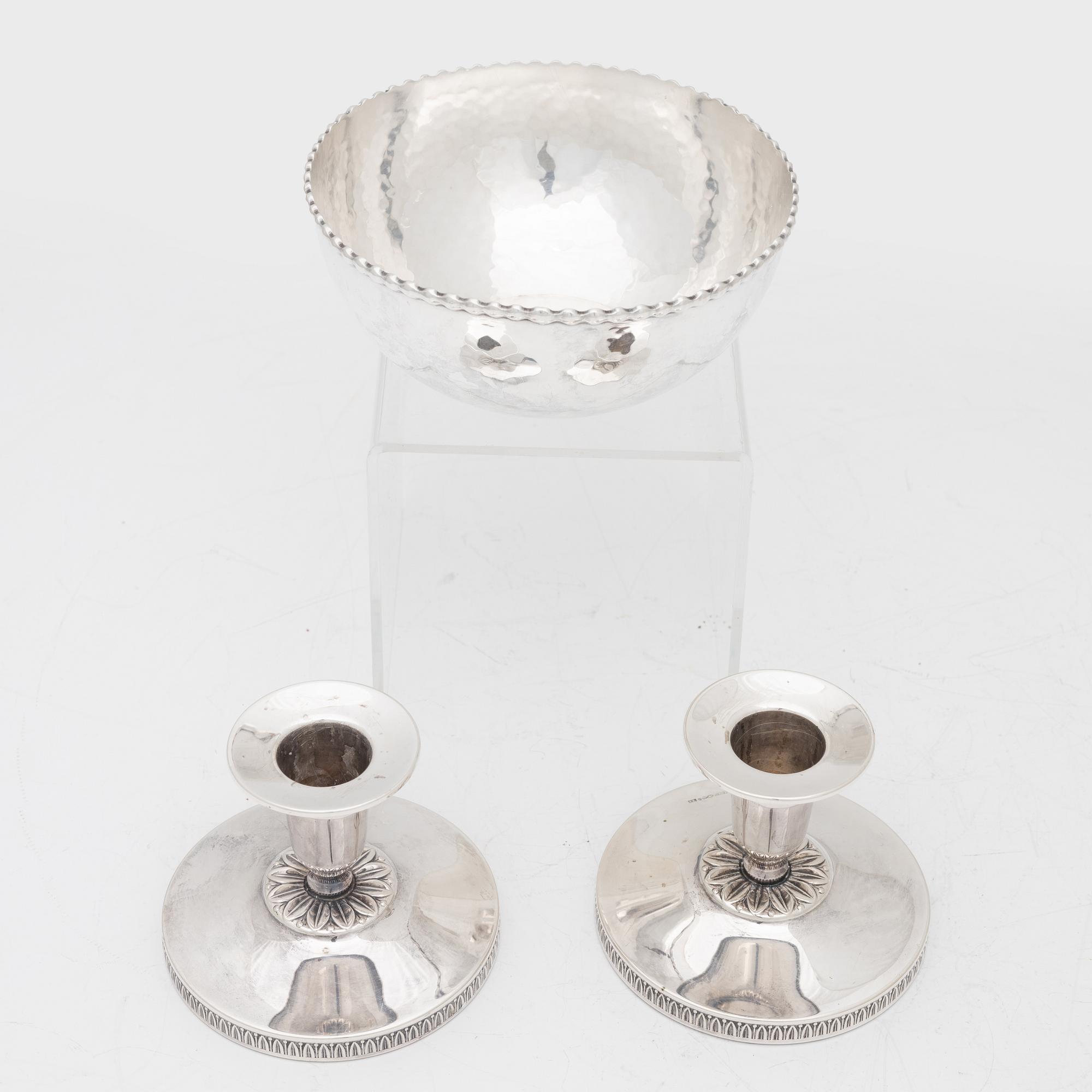 A pair of Swedish silver candlesticks, and a bowl, 1930s–60s.