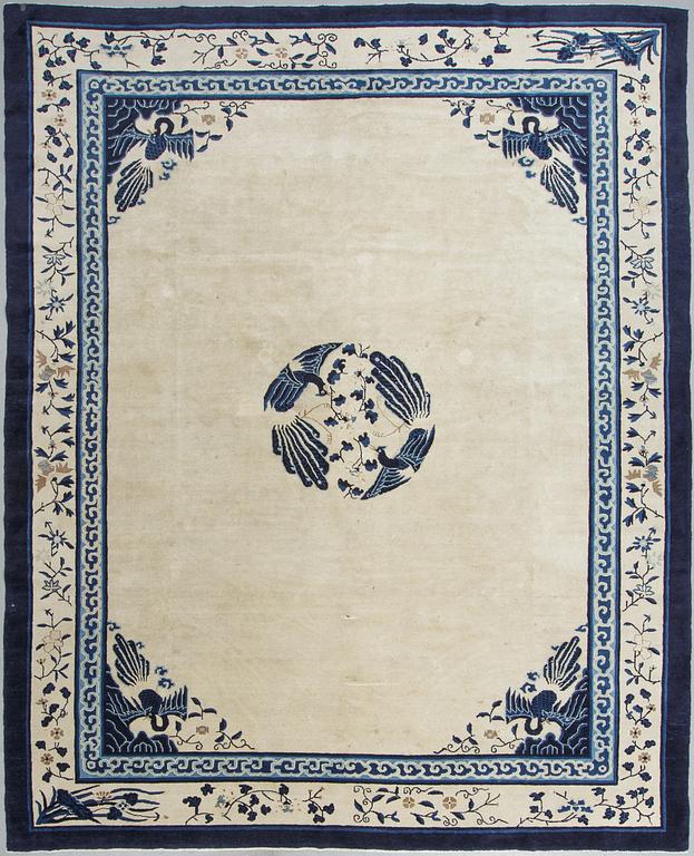 A carpet, a semi-antique China, ca 348,5-350 x 279,5-282,5 cm.