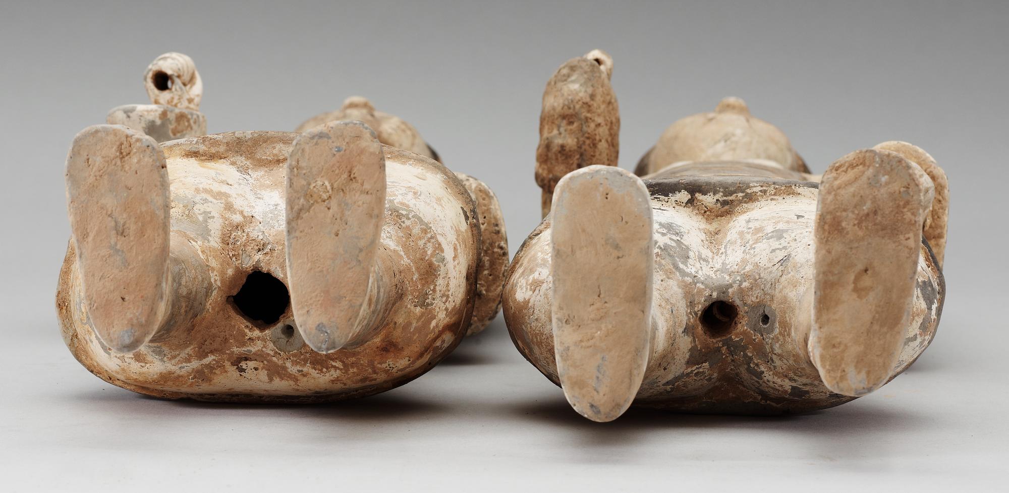 Two painted pottery figurines of standing soldiers, Han dynasty (206 BC- 220 AD).