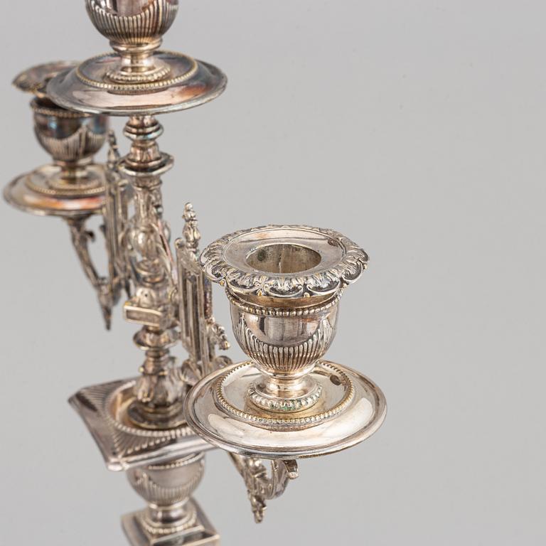A pair of silver plated candelabras, early 20th century.