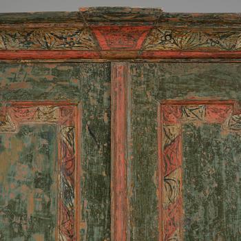 A Swedish polychrome-painted rococo cabinet, late 18th century.