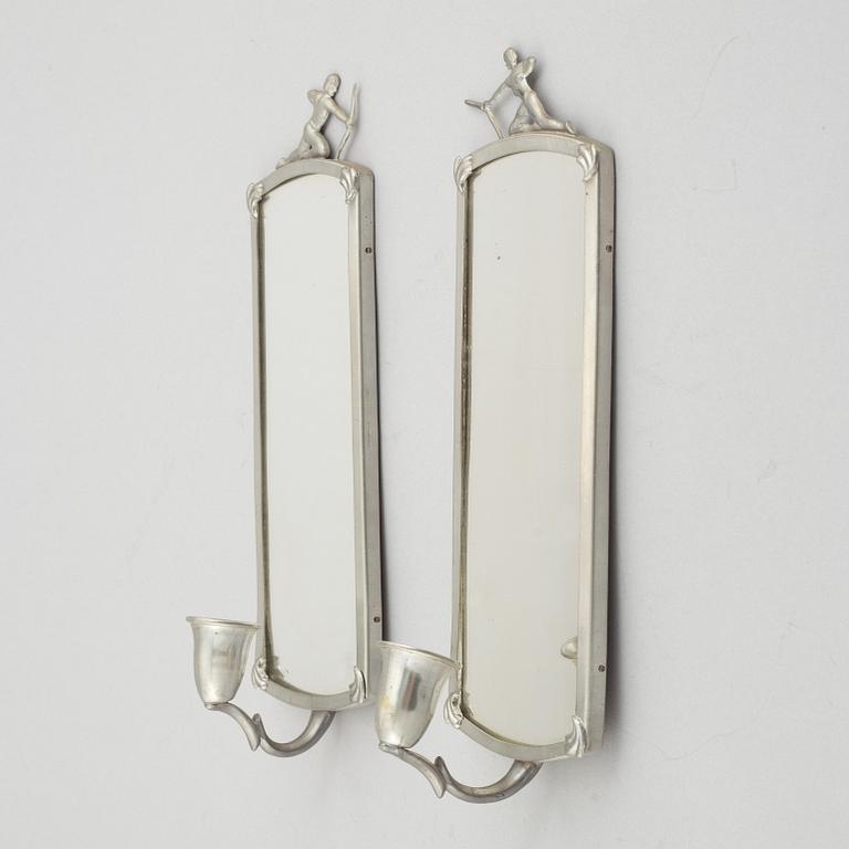 A mirror and a pair of wall sconces, 1920's/30's.