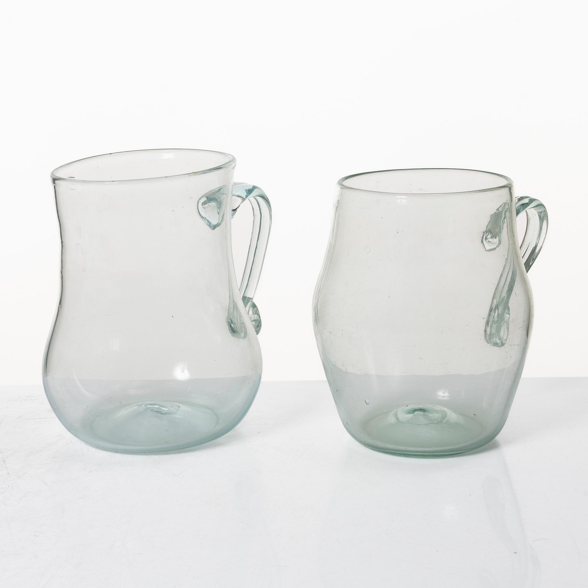 A set of two Swedish glass tankards, early 19th century.