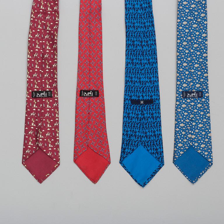 A set of four silk ties by Hermès.