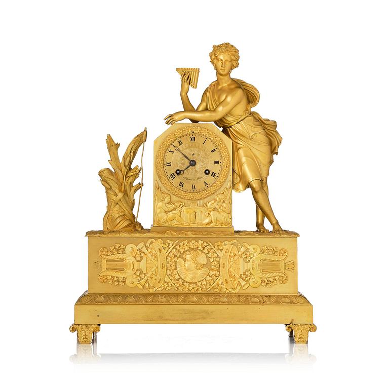 A French Empire ormolu and patinated bronze mantel clock, Paris, early 19th century.