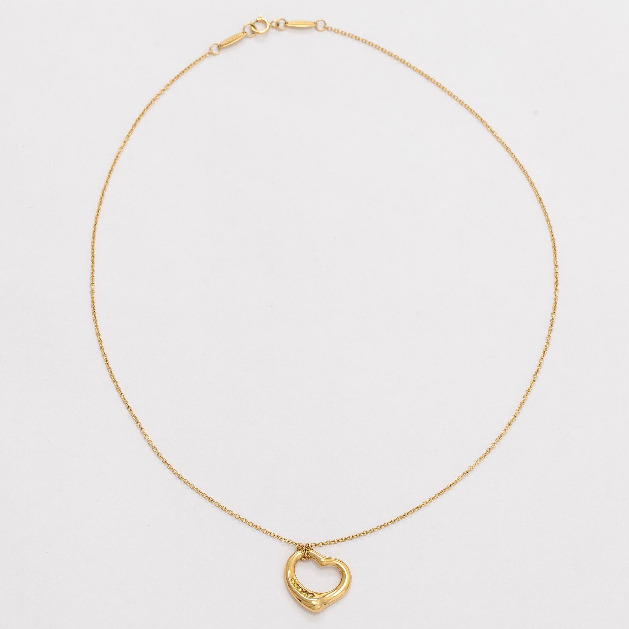 Tiffany & Co, Elsa Peretti, halsband, "Open Heart", 18K guld och gula diamanter.