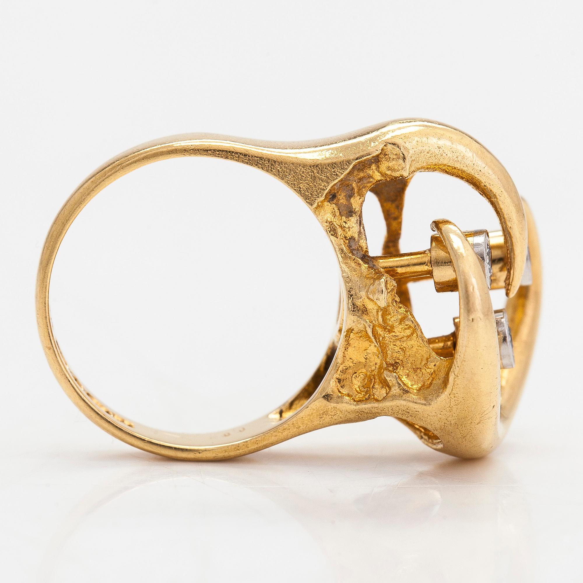 Björn Weckström, An 18K gold ring, with octagon-cut diamonds totalling ca 0.06 ct according to engraving. Lapponia 1974.