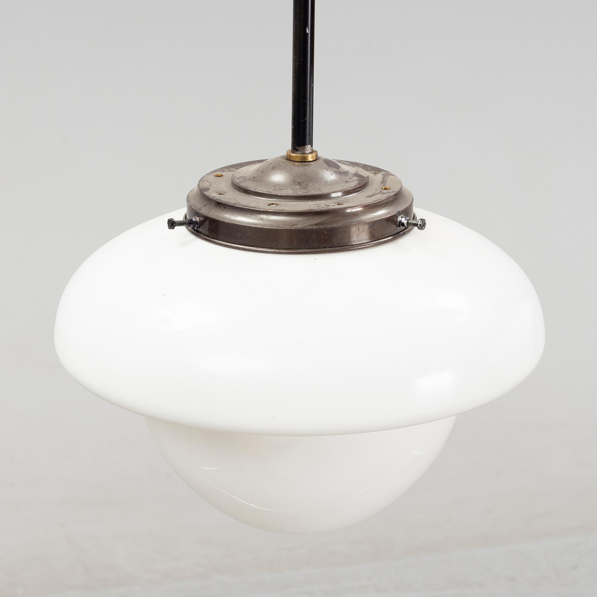 A pair of glass and patinated brass ceiling lights, Asea, 1930's.