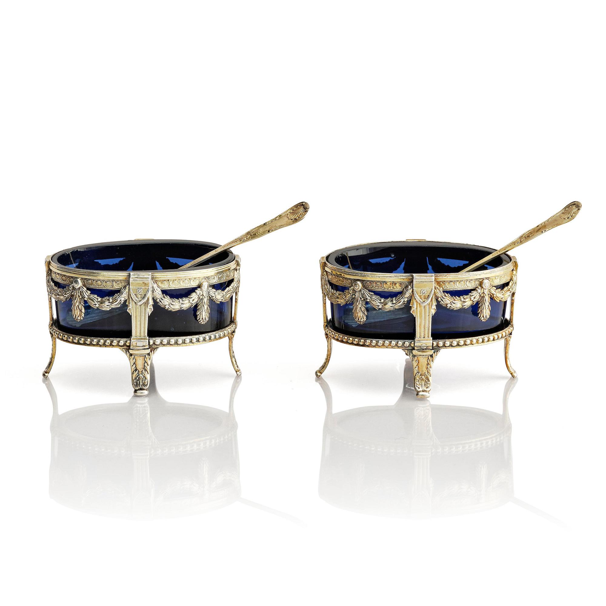 A pair of Swedish 18th century silver and blue glass salt cellars, mark of Pehr Zethelius, Stockholm 1775.