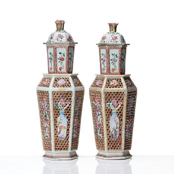 A pair of famille rose vases with covers, Qing dynasty, Qianlong (1736-95).