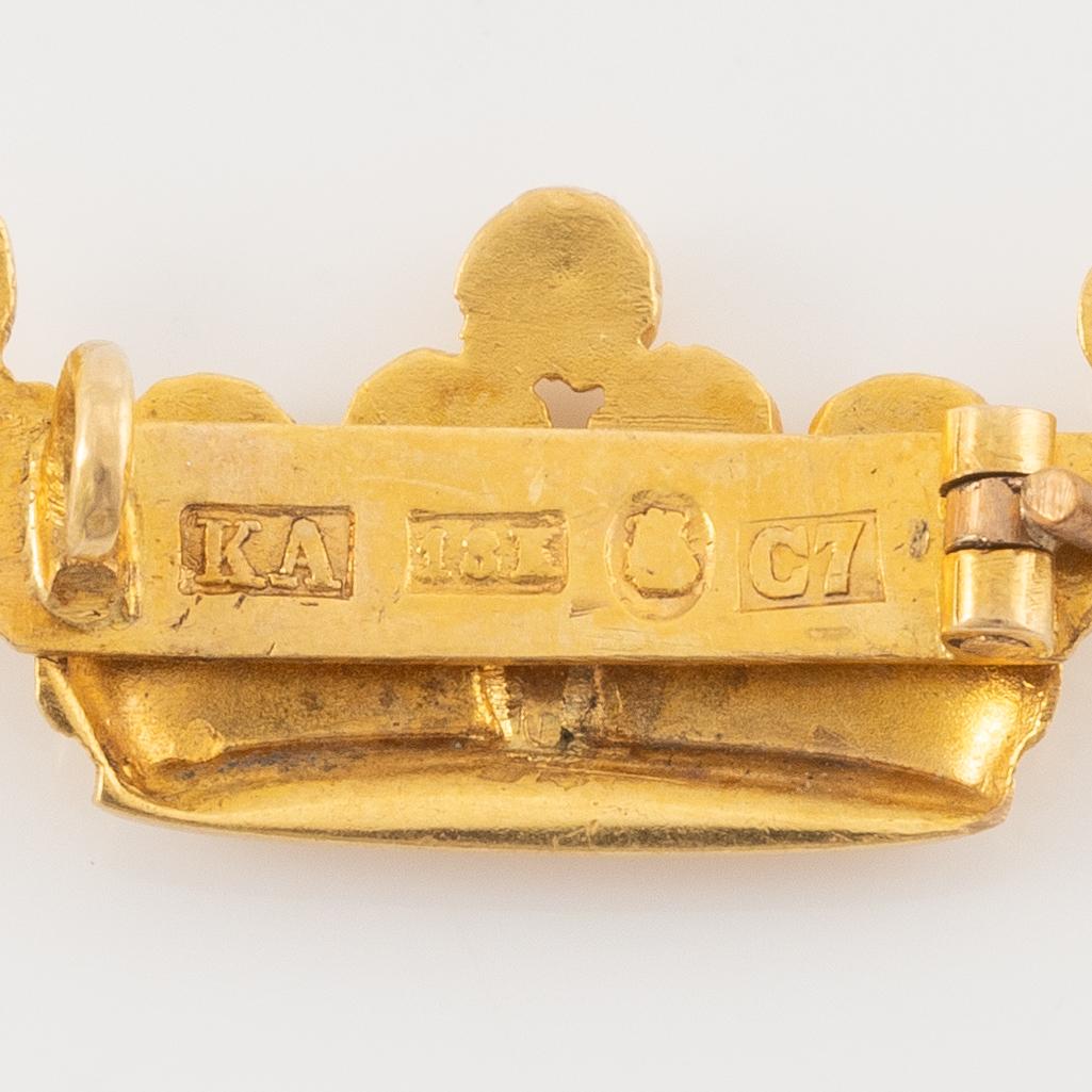 Brooch 18K gold.