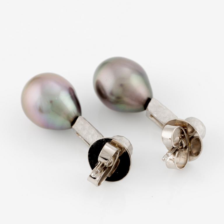 Earrings, a pair, 18K white gold with drop-shaped cultured black pearls and baguette and brilliant-cut diamonds.