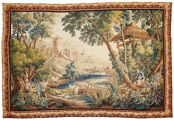 175. A TAPESTRY, "A Pastoral scene", tapestry weave, ca 275,5-278,5 x 407 cm, Aubusson, France around the middle of the 18th.