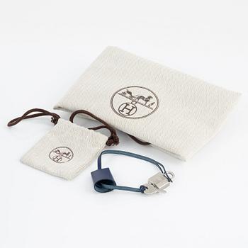 Hermès, a 'Herbag Zip 31' handbag in Bleu Saphir Hunter leather and Bleu Billard military canvas, 2021.