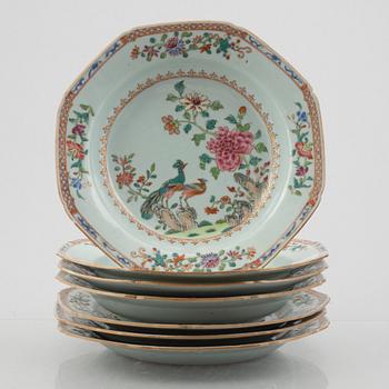 A set of seven (3+4) famille rose 'double peacock' plates, Qing dynasty, Qianlong (1736-95).