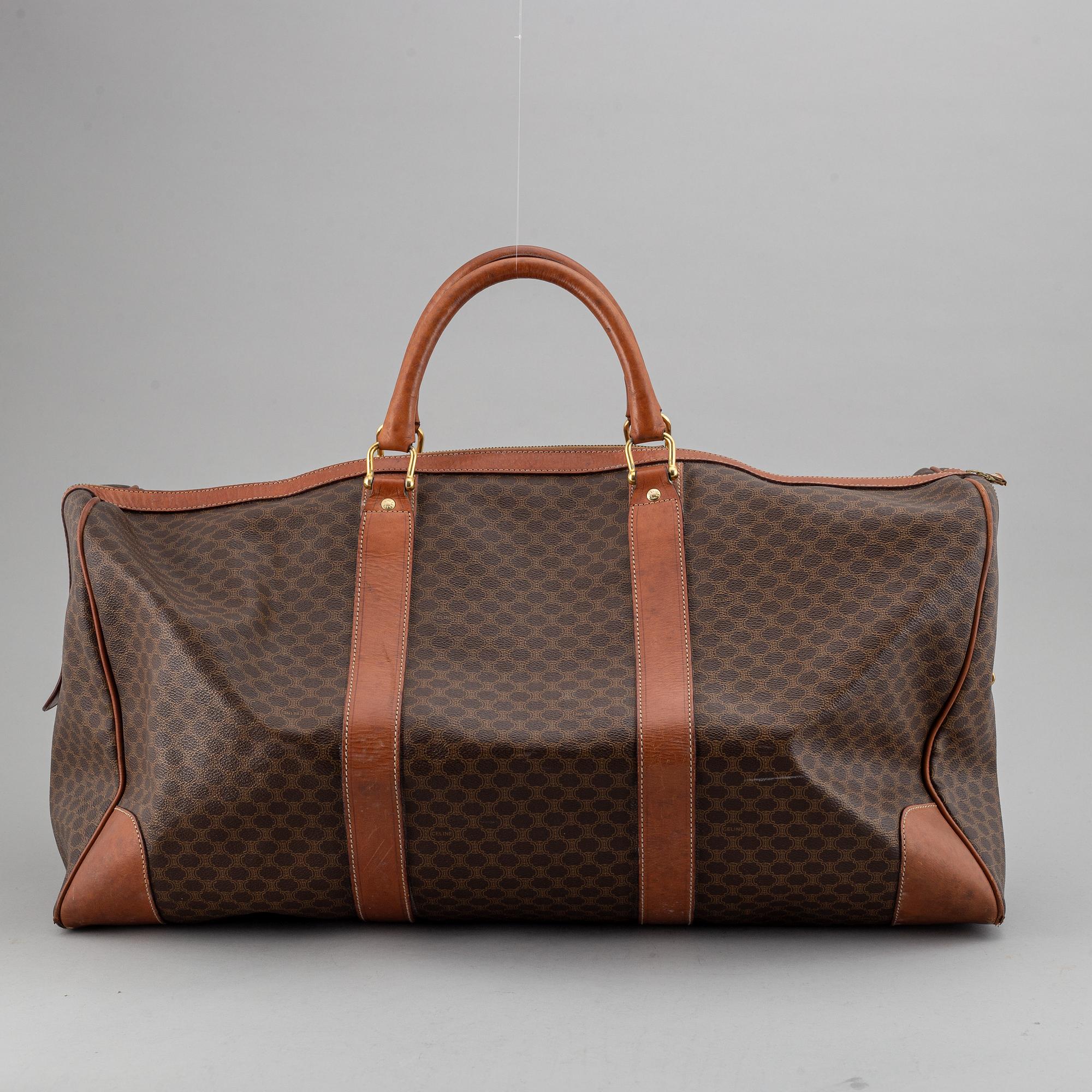 CÉLINE, monogram canvas weekendbag.