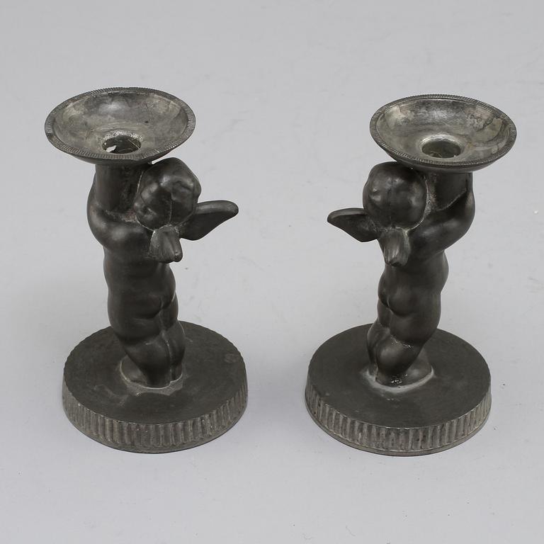 LJUSSTAKAR, ett par, tenn, Nils Fougstedt, Firma Svenskt Tenn, 1930.