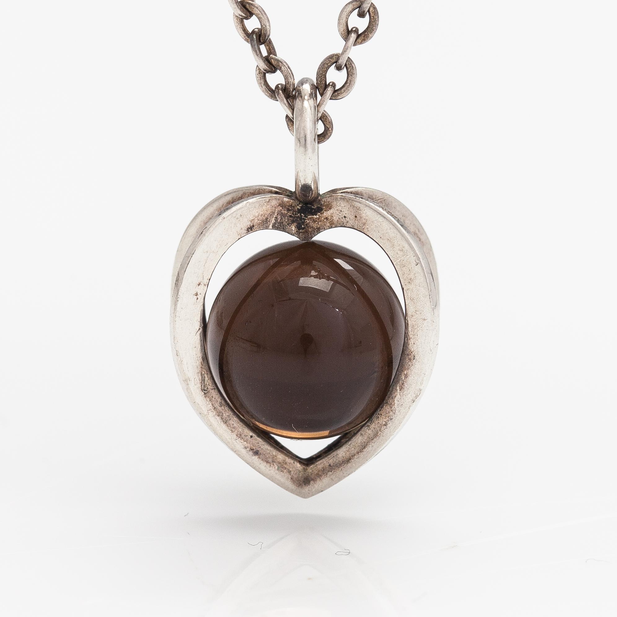 Elis Kauppi, A silver necklace with a smoaky quartz. Kupittaan kulta, Turku.