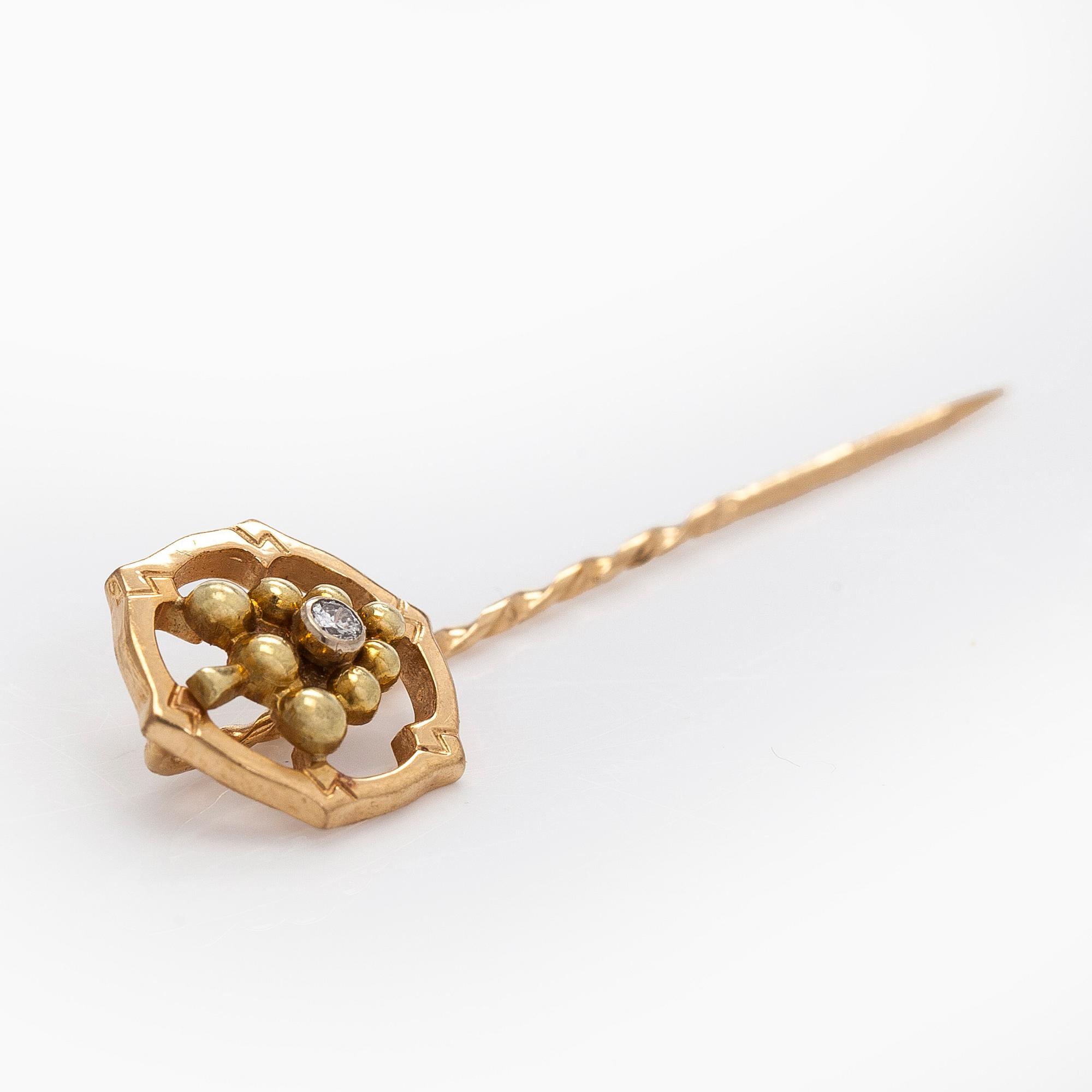 Slipsnål / kråsnål, briljantslipad diamant, 18K guld.
