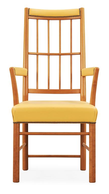 A Josef Frank cherry and yellow leather armchair, Svenskt Tenn, model 652.