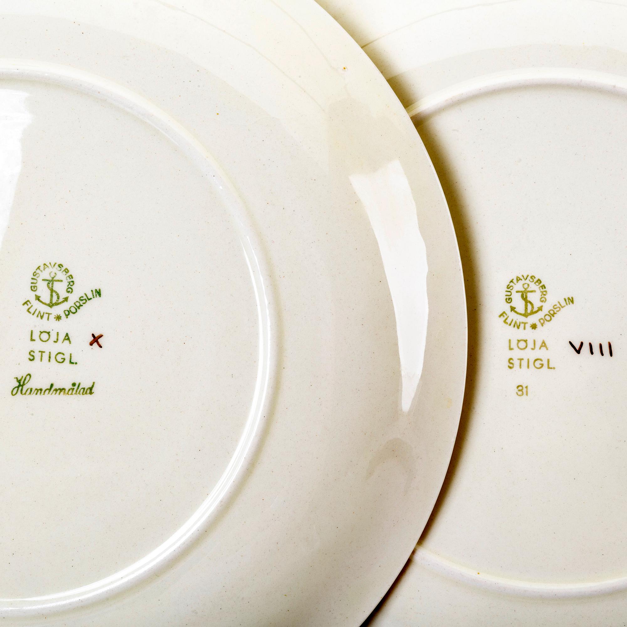 Stig Lindberg, a set of six 'Löja' creamware plates, Rörstrand.