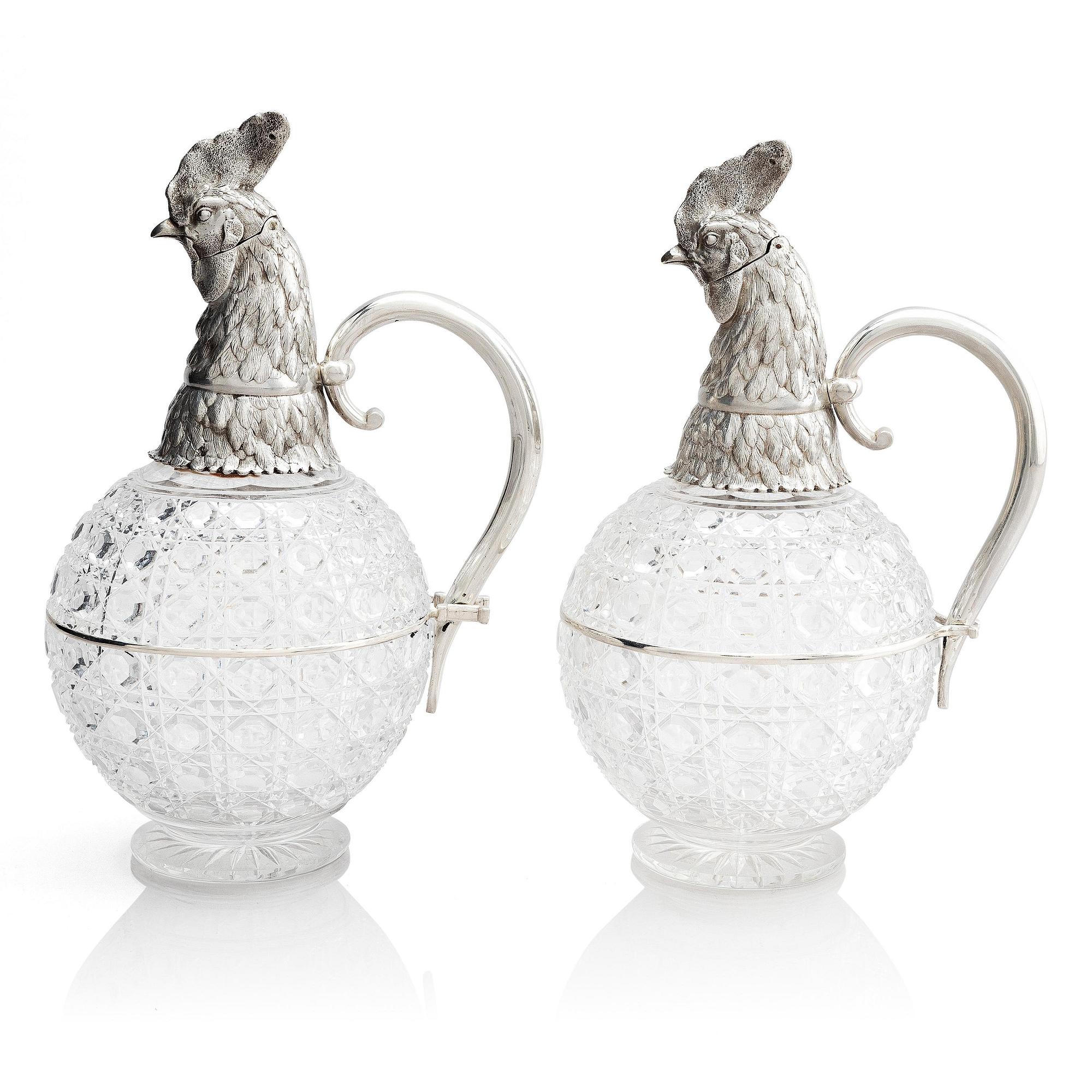A pair of silver and cut-glass decanters, mark of Gratchev company, St. Petersburg 1908-1917.