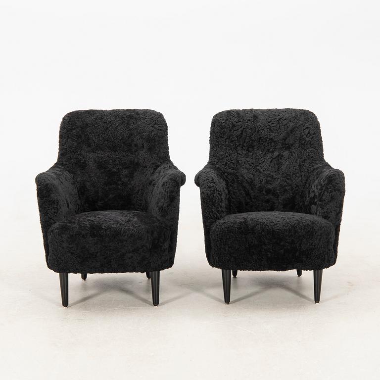 Carl Malmsten, a pair of "Samsas" armchairs, late 20th century.