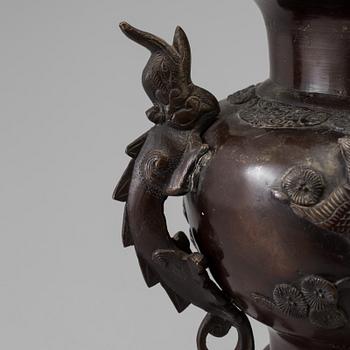 A Japanese bronze vase and cover, Meiji, late 19th century.