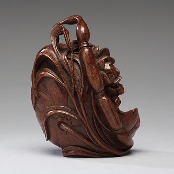 A bamboo carving of a crab and lotus, late Qing dynasty.