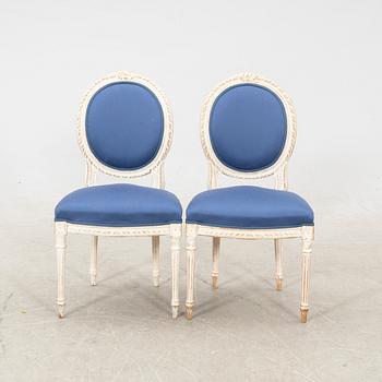 A pair of painted Louis XZVI style chairs first half of the 20th century.