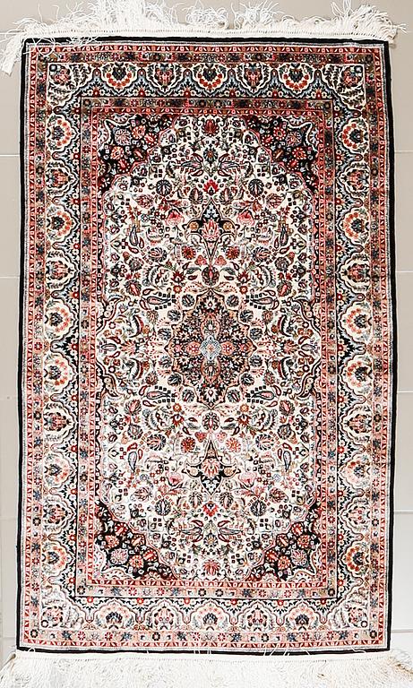 A chinese rug, probably, silk, 152 x 94 cm.