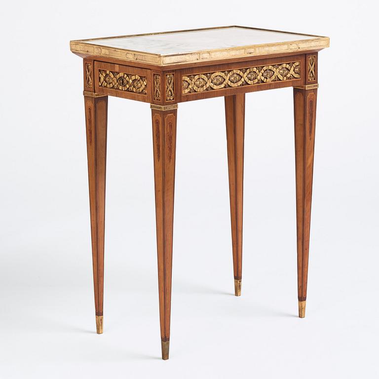 A Gustavian marquetry, ormolu-mounted, and marble table by G. Iwersson (master in Stockholm 1778-1813), signed 1781.