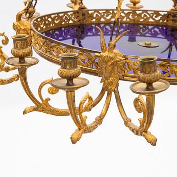 A gilt bronze sixteen-light Empire-style chandelier, later part of the 19th century.