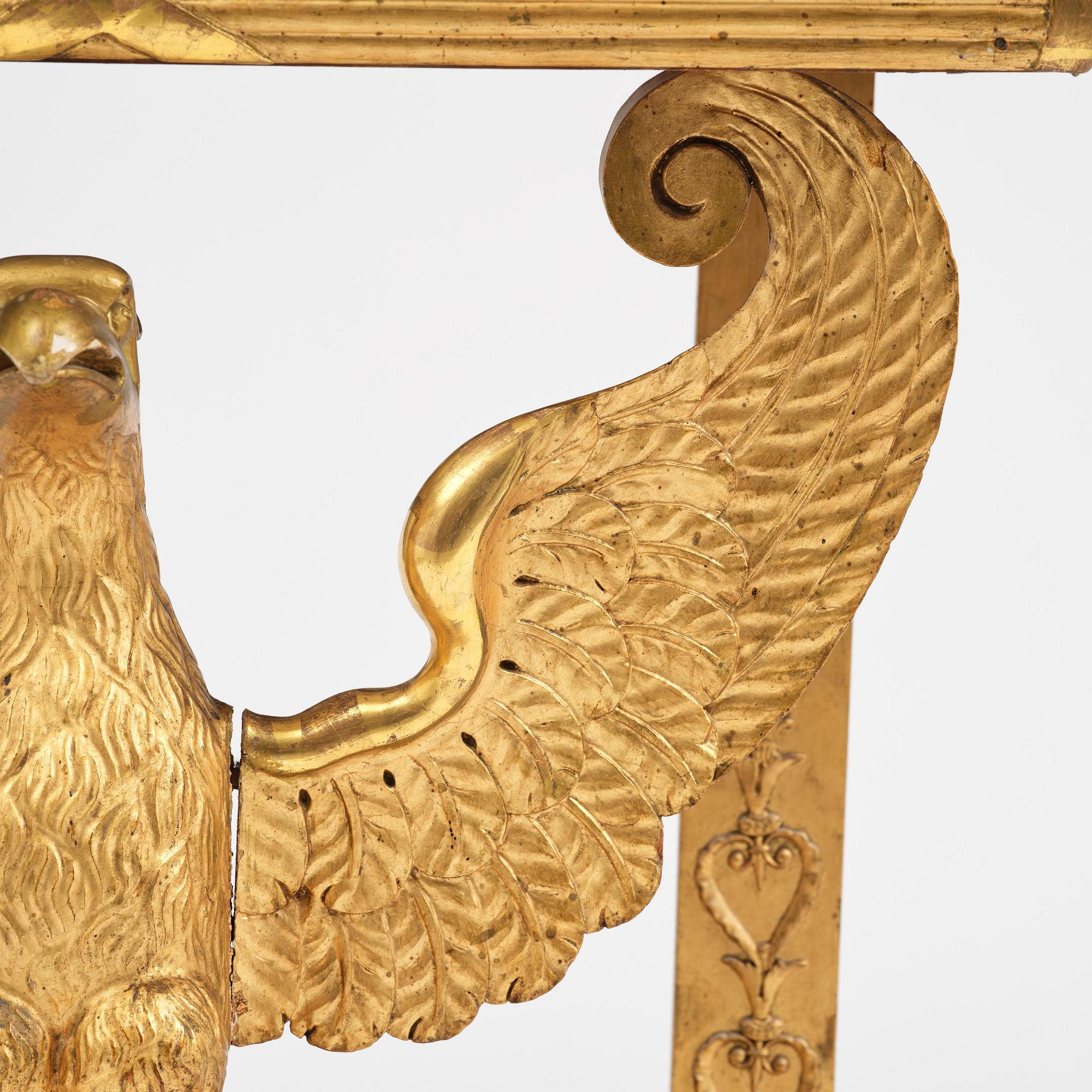 A Swedish Empire giltwood console table, early 19th century.