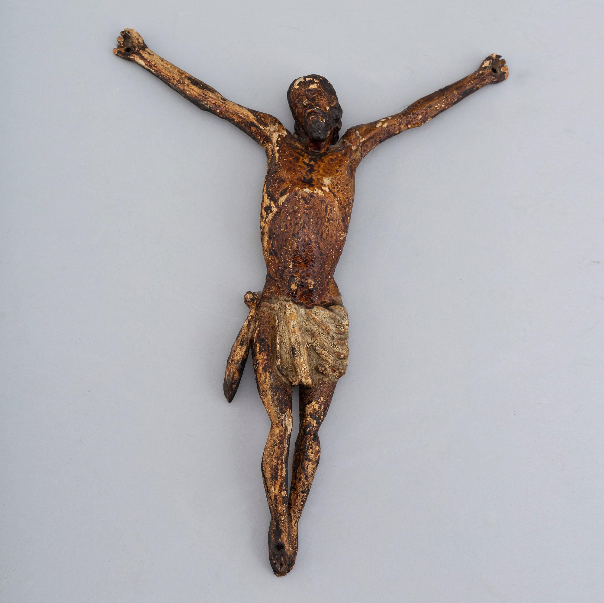 A 17th/18th century wooden crucifix.