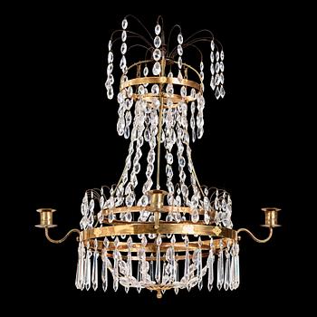 118. A late Gustavian four-light chandelier, early 19th century.