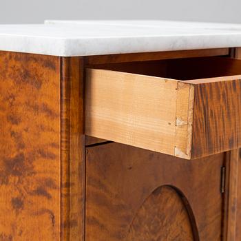 A pair of bedside tables, early 20th century.