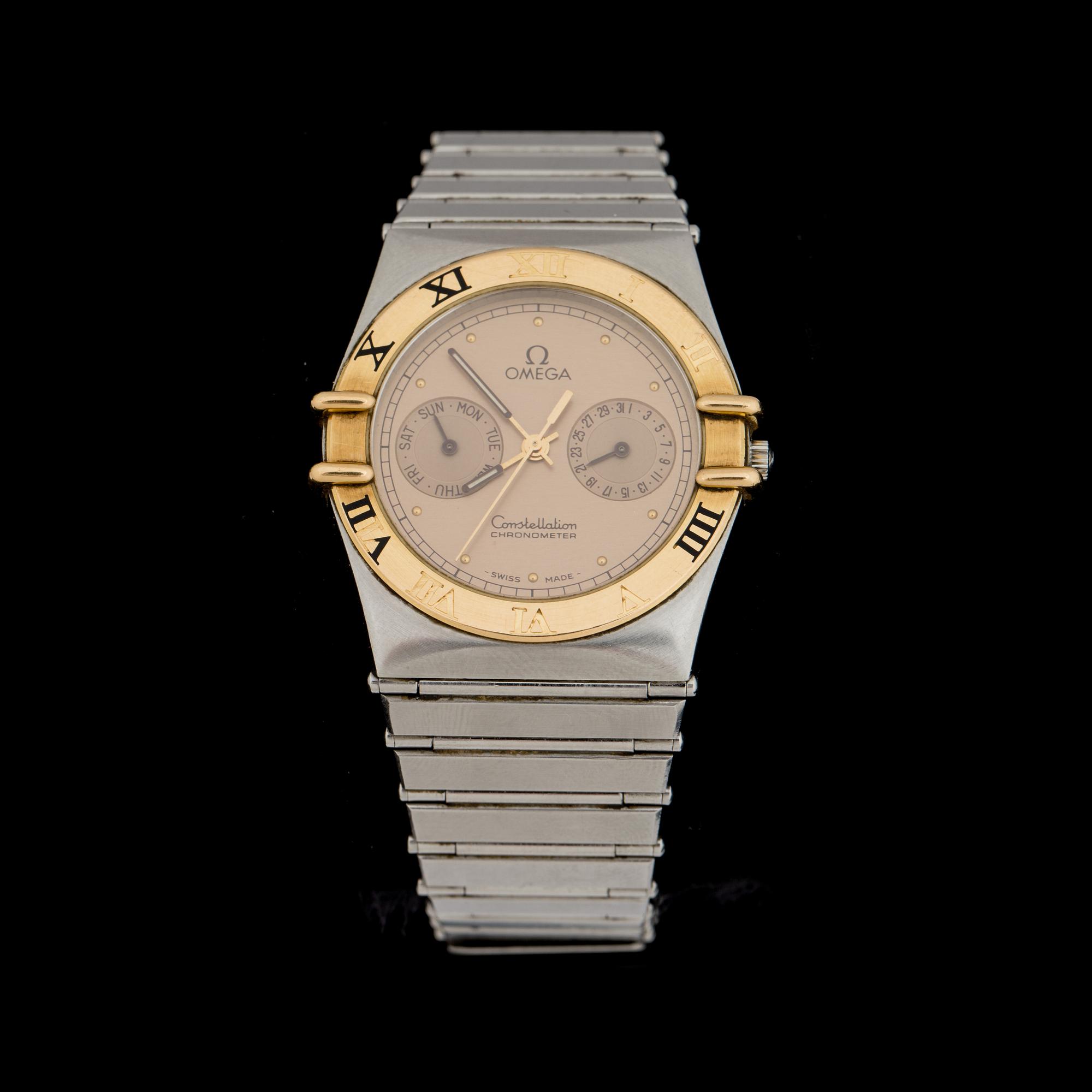 ARMBANDSUR, Omega Constellation.