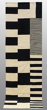 A runner, flat weave, ca 296 x 78 cm.