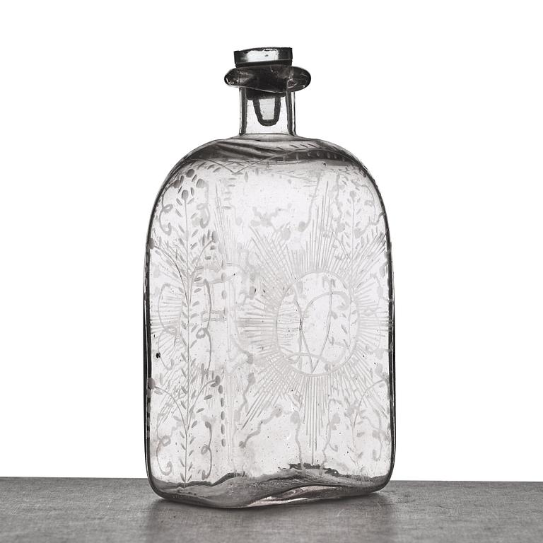 A glass bottle, 18th Century.