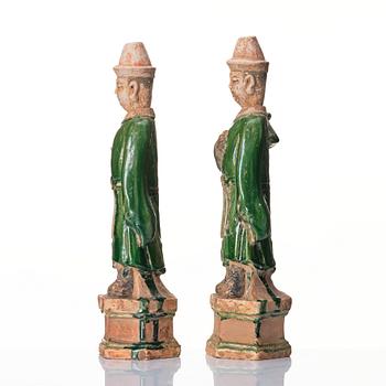 A pair of green glazed sculptures, Ming dynasty (1368-1644).