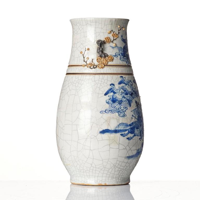 An underglaze blue and enamelled vase, Qing dynasty, 19th century.