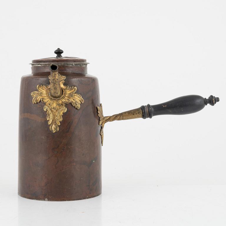 A Swedish copper and brass rococo coffee pot, later part of the 18th century.