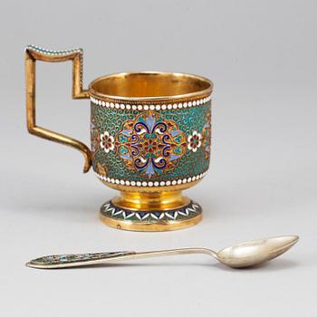 A Russian late 19th century silver-gilt and enameld tea-glass holder, unidentified makers mark, Moscow 1895.
