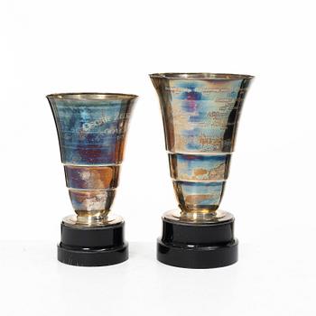 Guldsmedsaktiebolaget (GAB), Two silver vases on wooden bases, Stockholm 1931-1933.